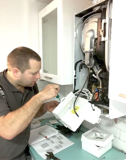 Anton working on a domestic boiler